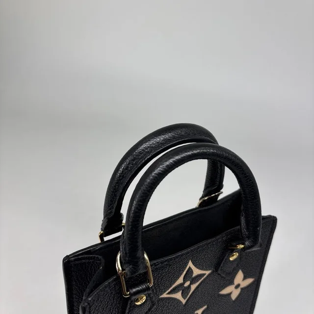 Louis Vuitton Monogram Empreinte Sac Plat Shoulder Bag in Leather from The Reluxe, photo 2 of 2