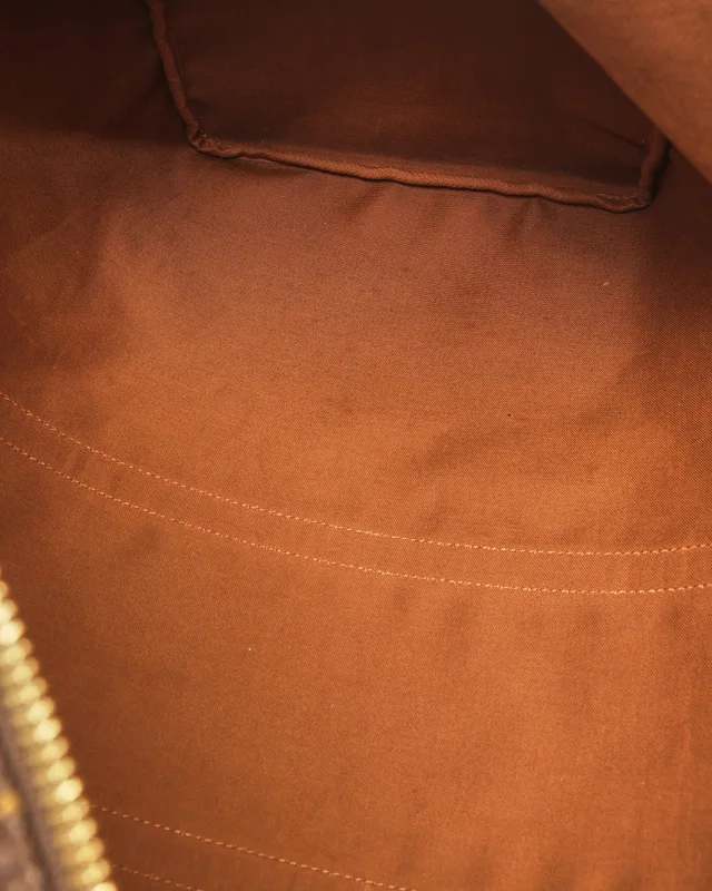 Louis Vuitton Monogram Keepall 60 Weekend Bag in Coated canvas from A Retro Tale, photo 8 of 10