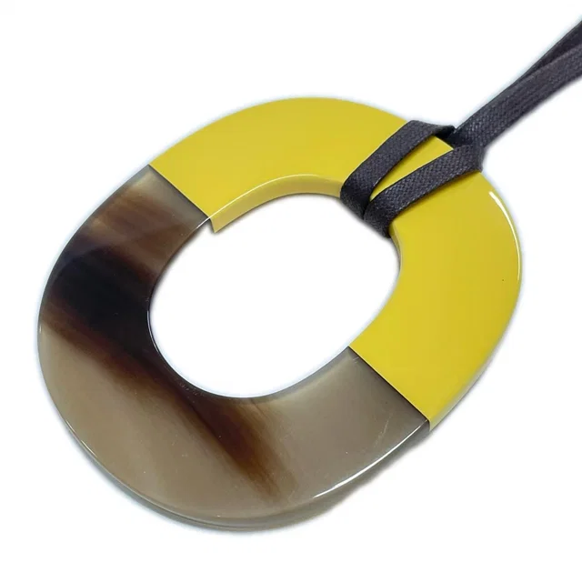 Hermès Pendant Buffalo Horn Lacquer Ismu Brown Yellow in Brown from The Reluxe