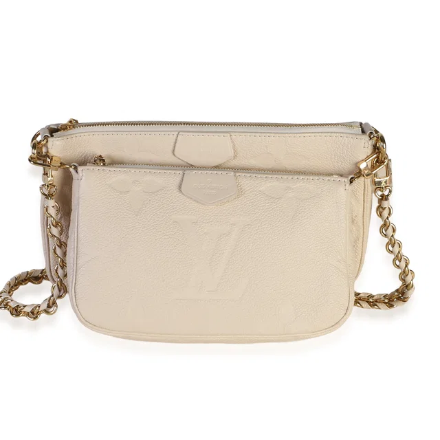 Louis Vuitton Cream Giant Monogram Empreinte Multi Pochette Accessoires in White Coated canvas from myGemma