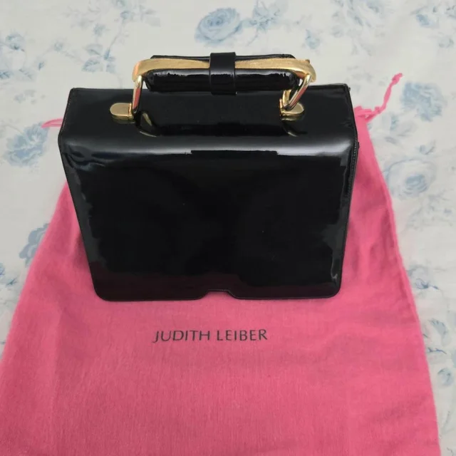 Judith Leiber Women's Bag - Black/Gold in black|gold from Depop, photo 1 of 1