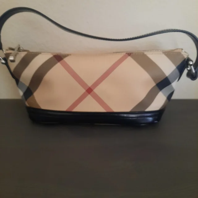 Burberry Pochette Bag in black|brown|neutral from Poshmark