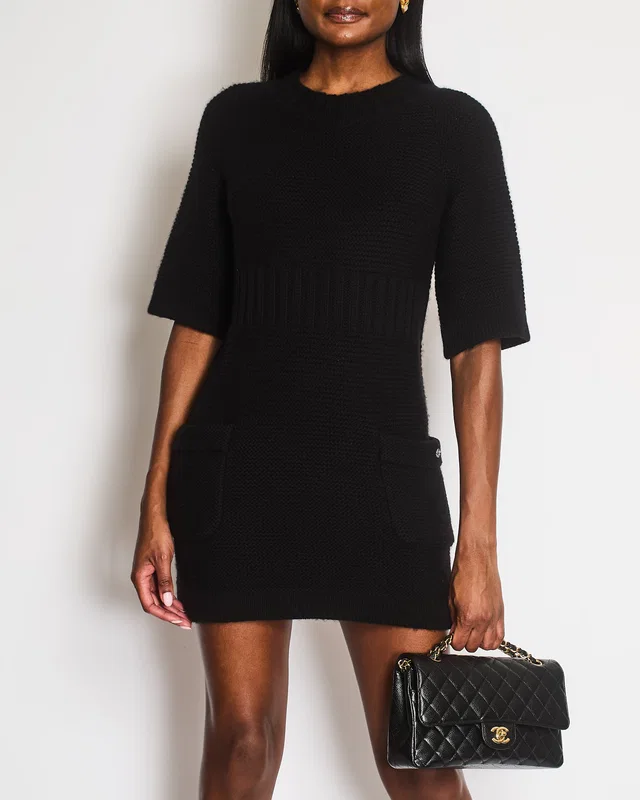 Chanel Black Wool Knitted Short-Sleeved Mini Dress with Front Pockets and Silver Textured CC Logo… in Black Wool from Sellier