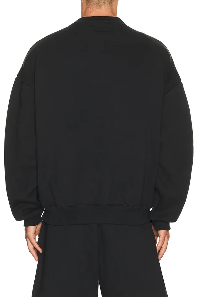 Fear of God ESSENTIALS 90'S Crewneck Sweatshirt in Vintage Black, photo 2 of 5 from REVOLVE (Canada)