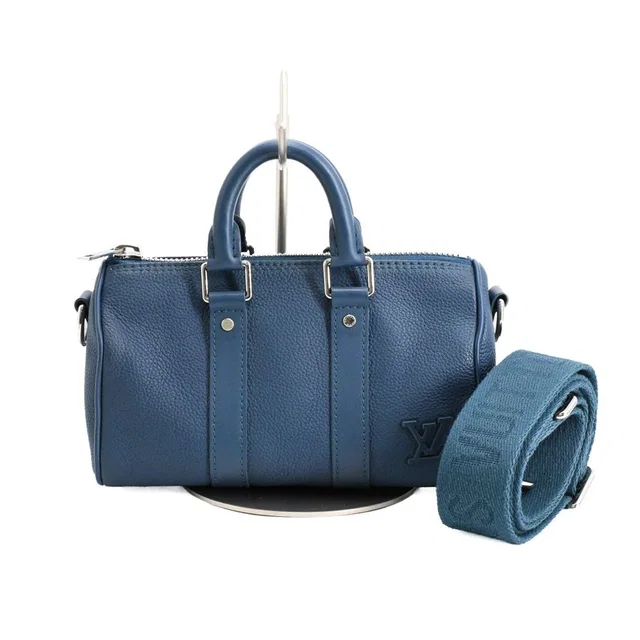 Louis Vuitton Shoulder Bag Keepall XS in Leather from The Reluxe
