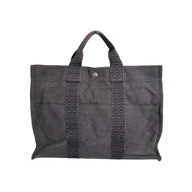 Hermès Business Bag Herline MM Tote Gray in Grey Canvas from The Reluxe