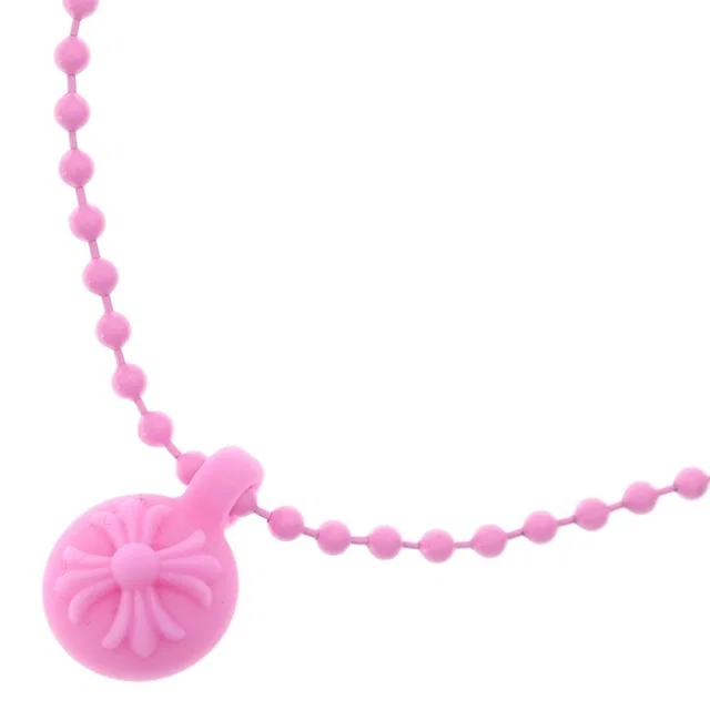 Chrome Hearts Rubber CH Ball Cross Silicone Necklace Pink in Pink from The Reluxe