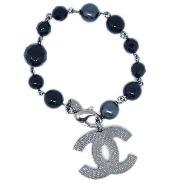 Chanel Bracelet Artificial Pearl Black A11V in Black Resin from AMORE Vintage Tokyo