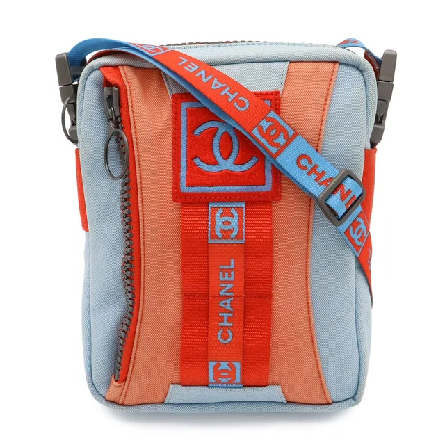 Chanel Sports Line CC Logo Shoulder Bag Pochette Crossbody Nylon Canvas Light in Canvas from The Reluxe