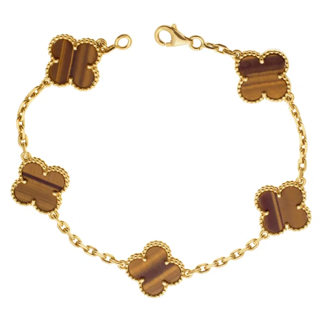 Van Cleef & Arpels Vintage tiger eye Alhambra bracelet in Yellow Gold from Gray And Sons