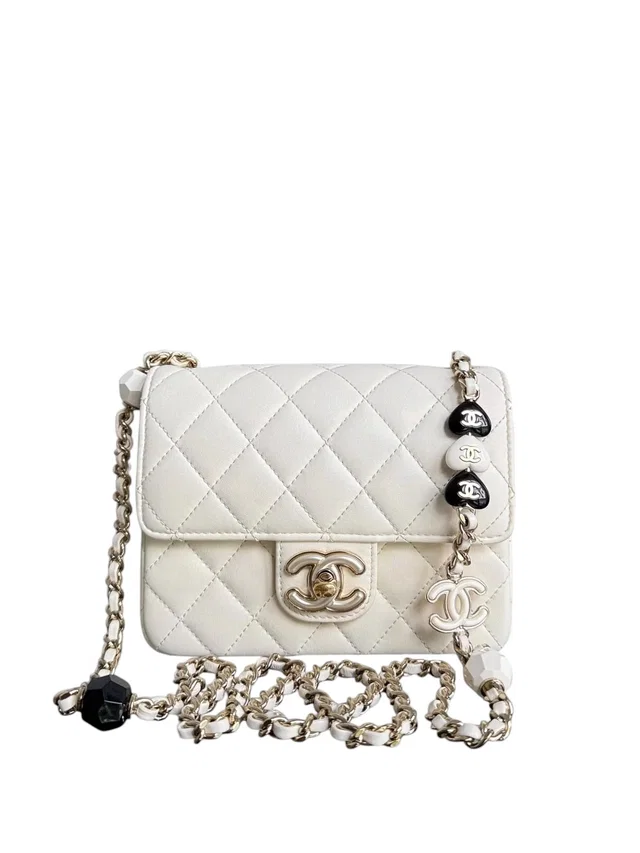 Chanel Classic Flap Mini Square - Lambskin Quilted White Gold Hardware Microchip in White Lambskin from Luxury Promise