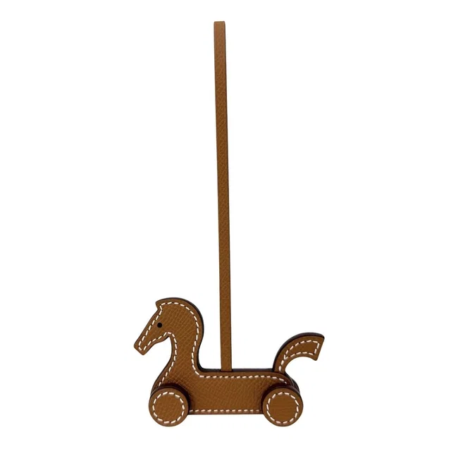 Hermès Key Holder Cheval Aroulette Charm Bag Leather Brown in Brown Leather from The Reluxe