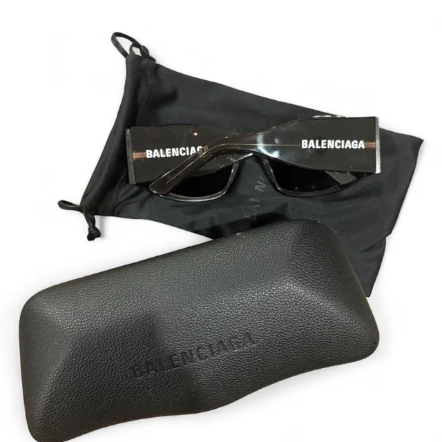 Balenciaga Women's Sunglasses - Black in black from Depop, photo 1 of 1