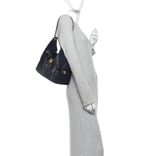 Caviar Quilted Small Chanel 25 Handbag Dark Navy in Navy Caviar leather from FASHIONPHILE, photo 2 of 6