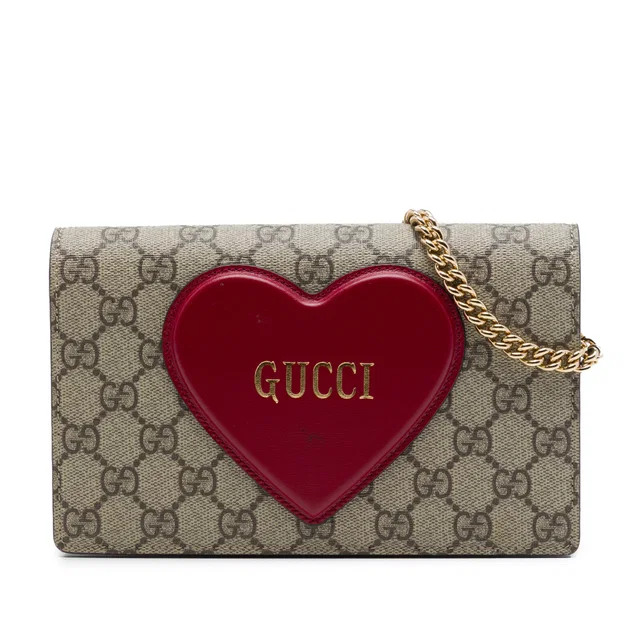 Red Gucci GG Supreme Heart Embellished Wallet on Chain Crossbody Bag in Red Coated canvas from Designer Revival, photo 1 of 1