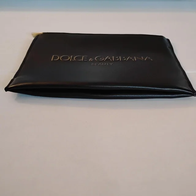 Dolce & Gabbana Women's Clutch bags - Black/Gold in gold|black from Depop, photo 7 of 9