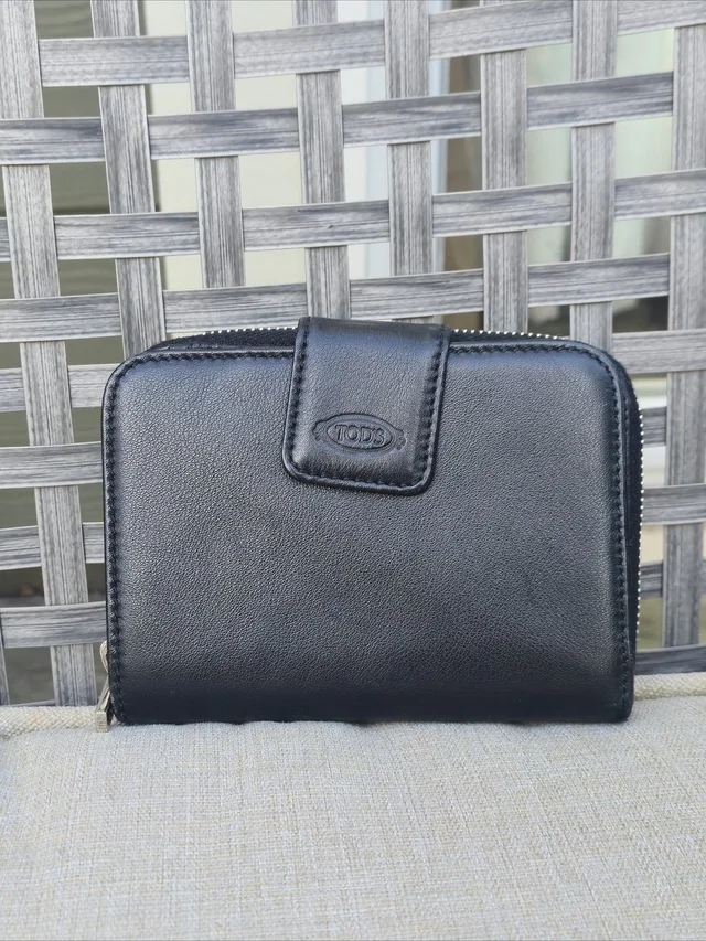 Tod's Zip-Around Wallet in black Leather from Poshmark