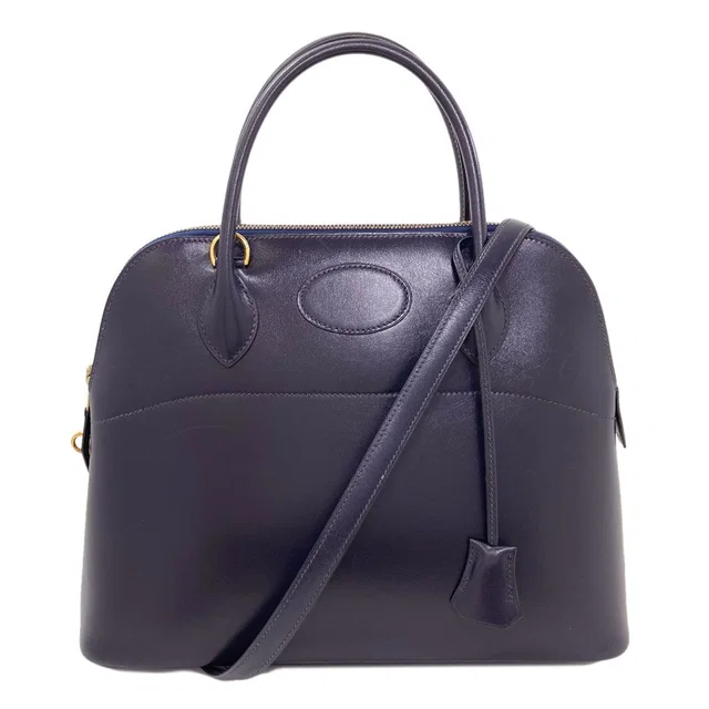 Hermès Bolide 31 Gold Handbag Box Calf in Gold Box leather from The Reluxe