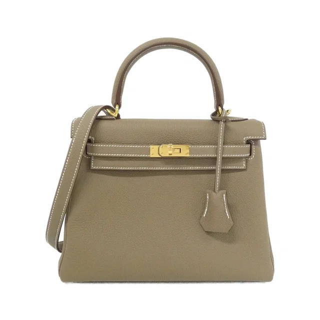 Hermès Kelly 25 Bag in Togo leather from The Reluxe