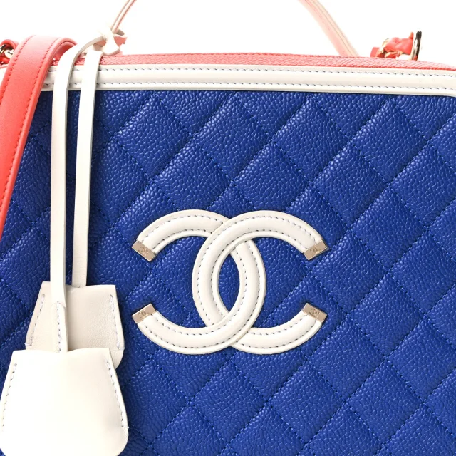 Chanel Caviar Quilted Large CC Filigree Vanity Case Blue White Red in White Caviar leather from FASHIONPHILE, photo 9 of 11