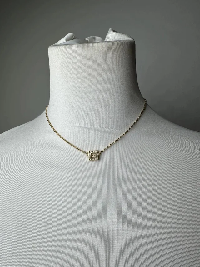 Givenchy Gold Crystal Logo Pendant Necklace in multicolor from Grailed