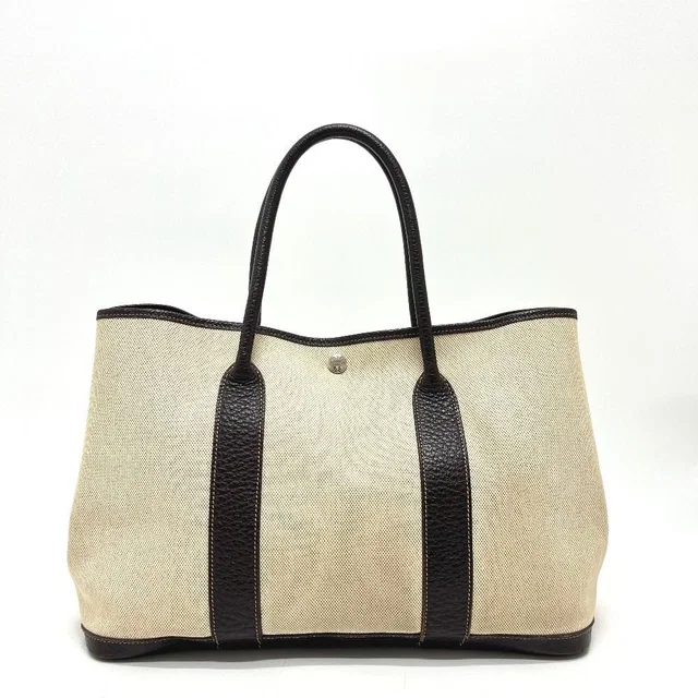 Hermès Tote Bag Garden Party PM Toile H Beige in Beige Leather from The Reluxe