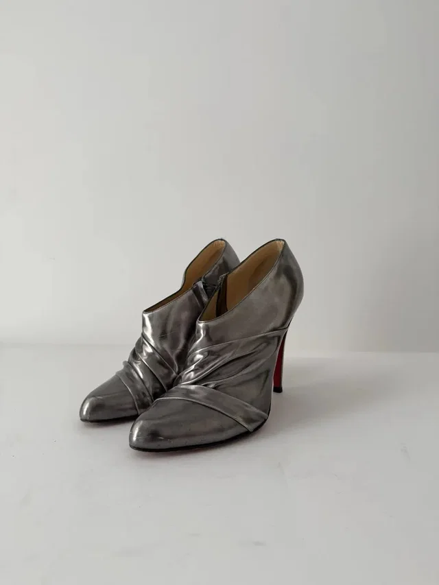 Christian Louboutin Metallic Ankle Booties - Size 38.5 in Silver in silver|gray Leather from Grailed