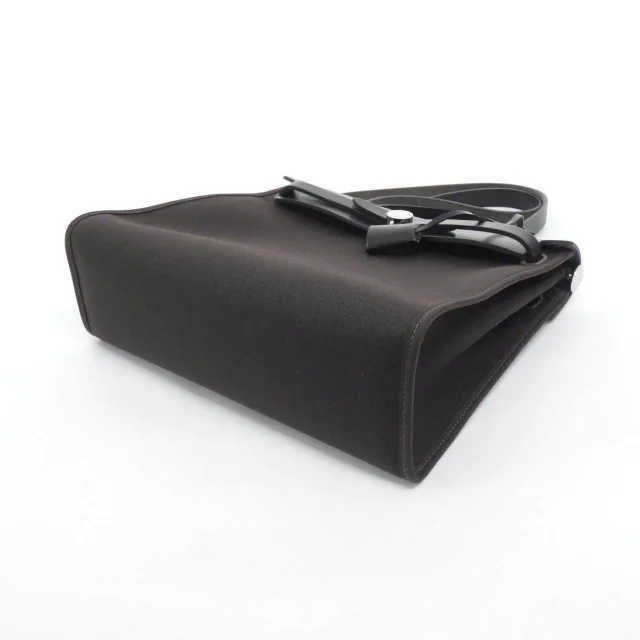 Hermès Herbag Zip PM Toile Military Vache Hunter Bag in Black Calfskin from LuxUness, photo 3 of 9