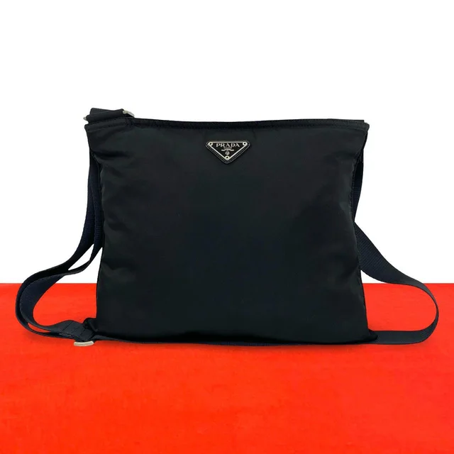 Prada Tessuto Pocono Nylon Shoulder Bag Pochette Crossbody Black in Black Nylon from The Reluxe