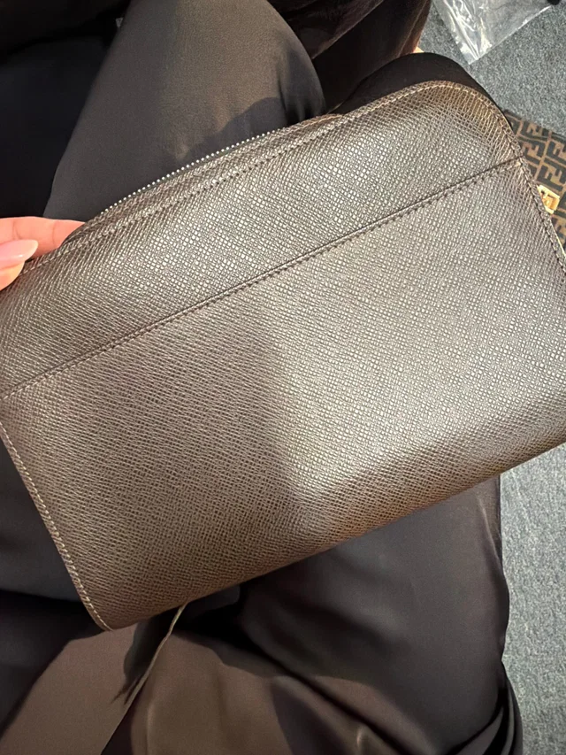 Louis Vuitton chocolate leather pouch 1uyzm2g5qz in Brown Leather from Luxury Promise