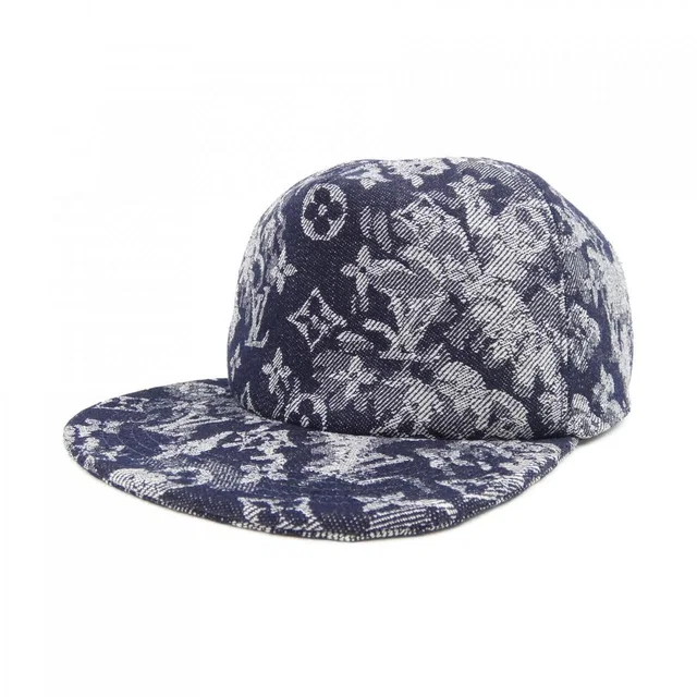 Louis Vuitton Monogram Tapestry Cap from The Reluxe