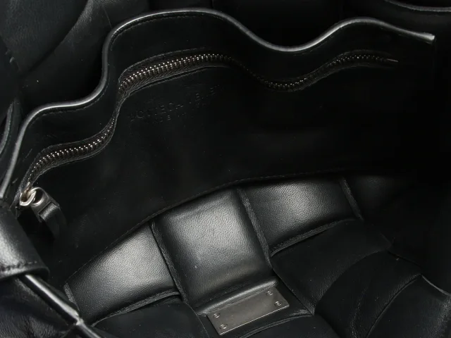 Bottega Veneta Maxi Black Padded Cassette Bag in Black Woven leather from Ann's Fabulous Finds, photo 8 of 9