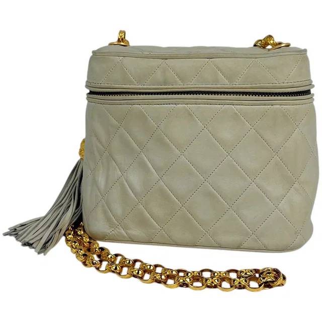 Chanel CC Logo Chain Shoulder Bag Quilted Fringe Leather White in White Leather from The Reluxe