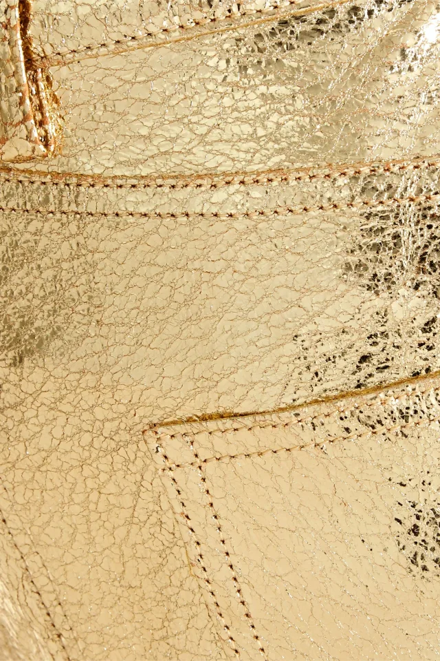 Retrofête Lunx Metallic Textured-Leather Flared Pants in Gold, photo 4 of 4 from THE OUTNET