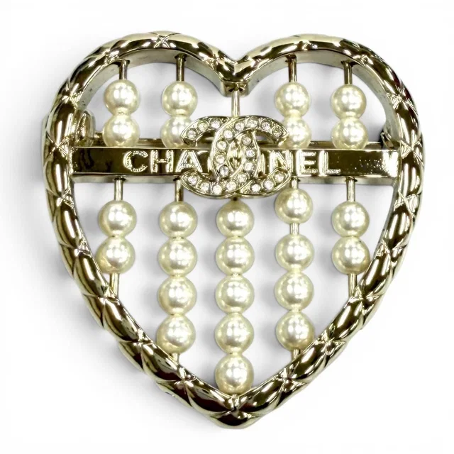 Chanel CC Logo Quilted Heart Brooch Gold White in White from The Reluxe