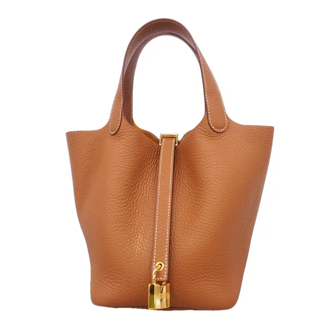 Hermès Handbag Picotin Lock PM Taurillon Clemence Gold in Gold Clemence leather from The Reluxe