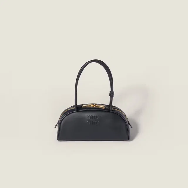 Miu Miu Embossed Logo Top Handle Bag — Black Leather in Black Leather from HEWI