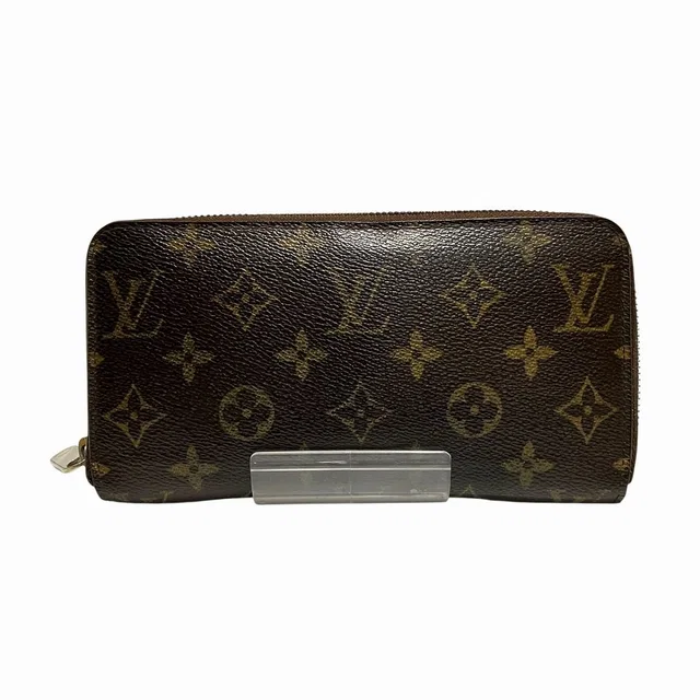 Louis Vuitton Zippy Wallet Monogram Canvas in Coated canvas from The Reluxe