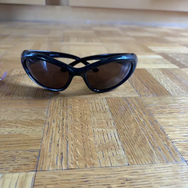 Balenciaga Women's Sunglasses - Black/Brown in brown|black|red from Depop, photo 1 of 1