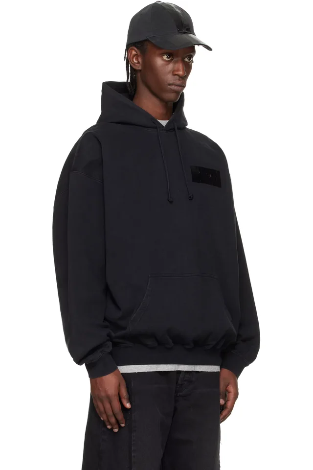 VETEMENTS Black Taped Logo Hoodie, photo 2 of 4 from SSENSE
