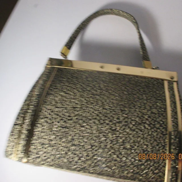 Bottega Veneta Women's Lyocell Bag - Gold in gold from Depop, photo 1 of 1