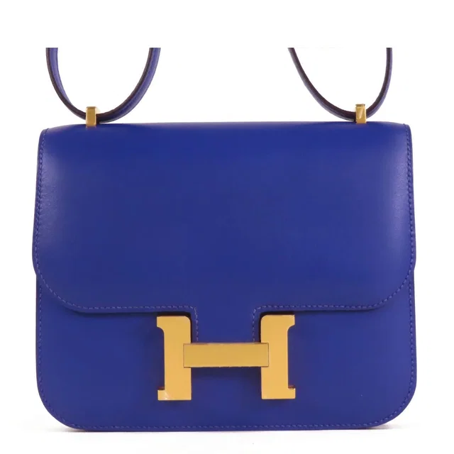 Hermès Constance 3 Mini 18 Blue Electric Gold Tadelakt Shoulder Bag in Blue from The Reluxe