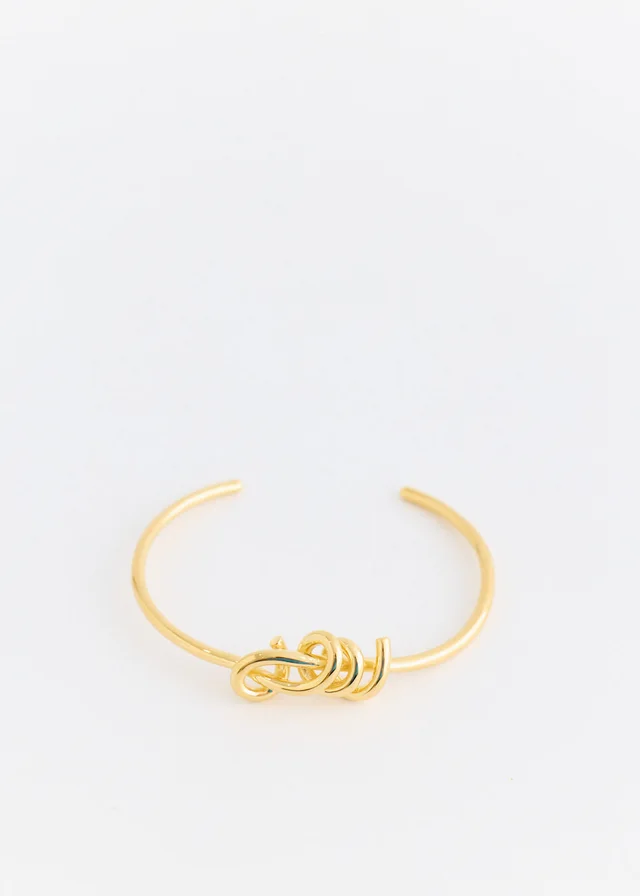 Completedworks Gold Knot Bracelet in Metallic from Incu, photo 1 of 1