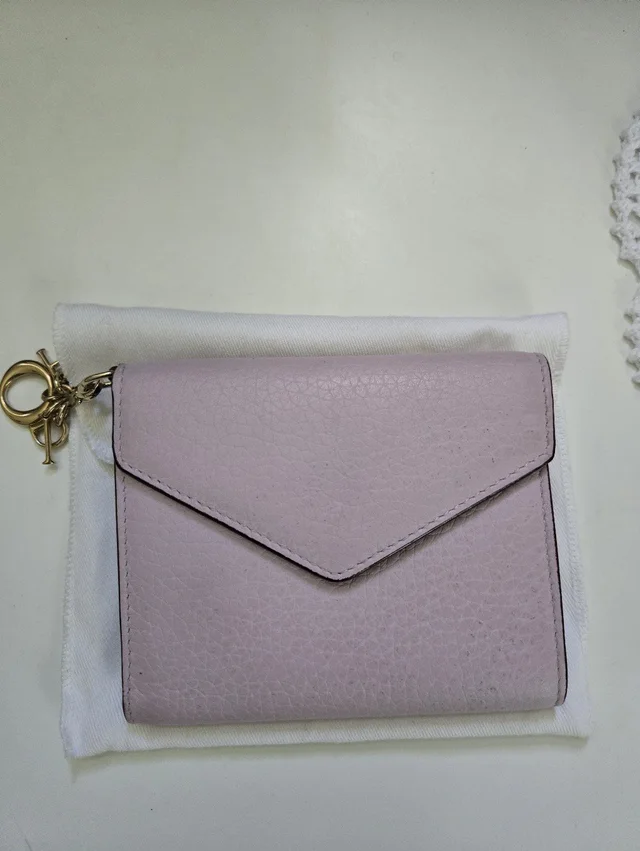 Dior Bifold Wallet in purple from Poshmark