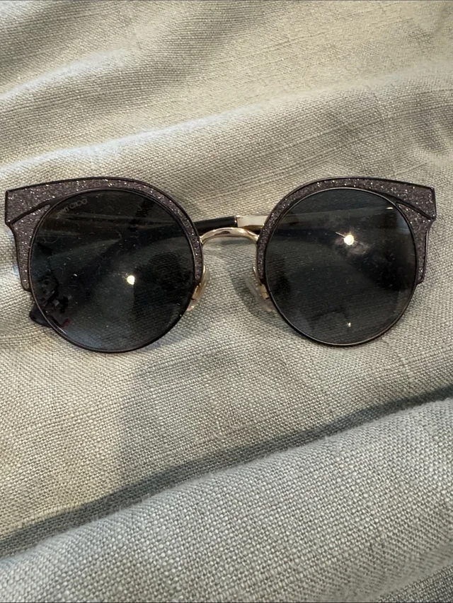 Jimmy Choo Glitter Round Sunglasses With Gold Bridge in black from Poshmark