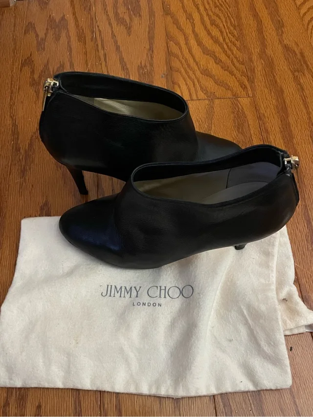 Jimmy Choo Black Leather Ankle Booties With Gold Zip Accent in black|gold Leather from Poshmark