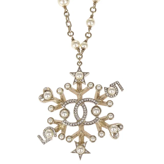 Chanel Rhinestone Costume Pearl Gold Snowflake Pendant Necklace B19B in Gold from AMORE Vintage Tokyo