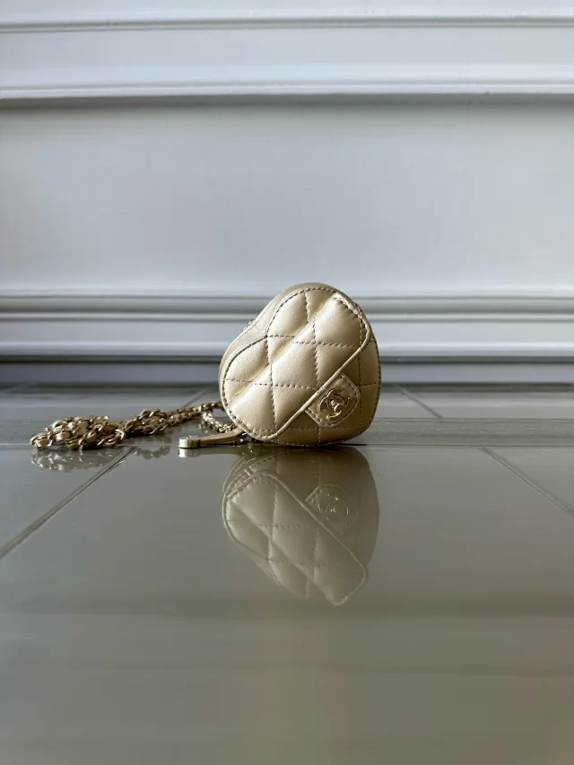 LONDON LOCATED* CHANEL MINI HEART NECKLACE Gold Lambskin Leather with Champagne-Toned Metal in Gold Lambskin from Luxury Promise, photo 6 of 9