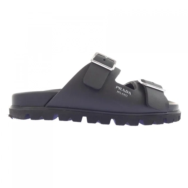 Prada Rubber Slide Screen Print Logo Sandals from The Reluxe