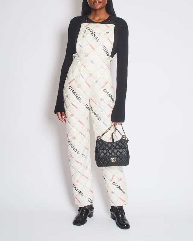 Chanel Fall 2021 White Quilted Ski Jumpsuit with Crystal Logo Details Size FR 34 (UK 6) in White from Sellier